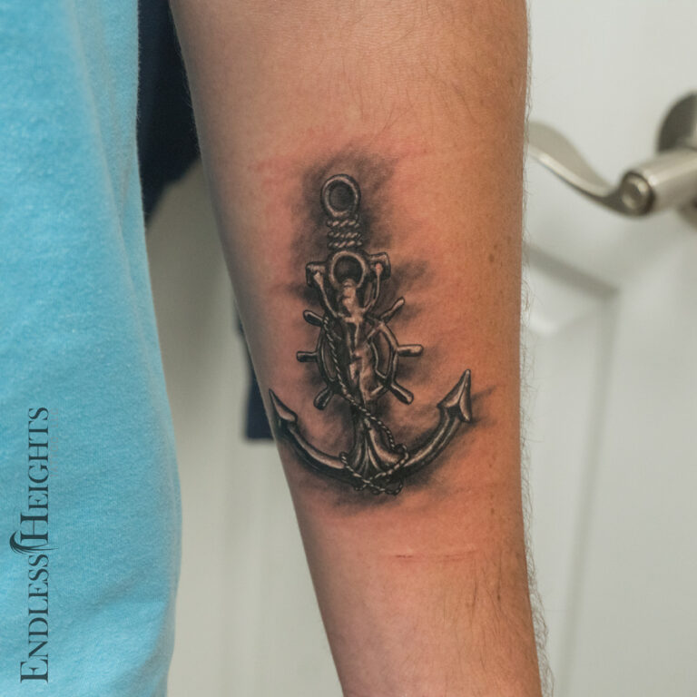 realism black and grey memorial anchor pendant - endless heights tattoo by artist dj donald voelker