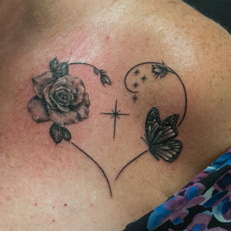 rose, heart, butterfly, star tattoo on chest - endless heights tattoo by artist dj donald voelker